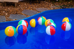 GiftExpress colorful inflatable beach ball for pool play and celebration.