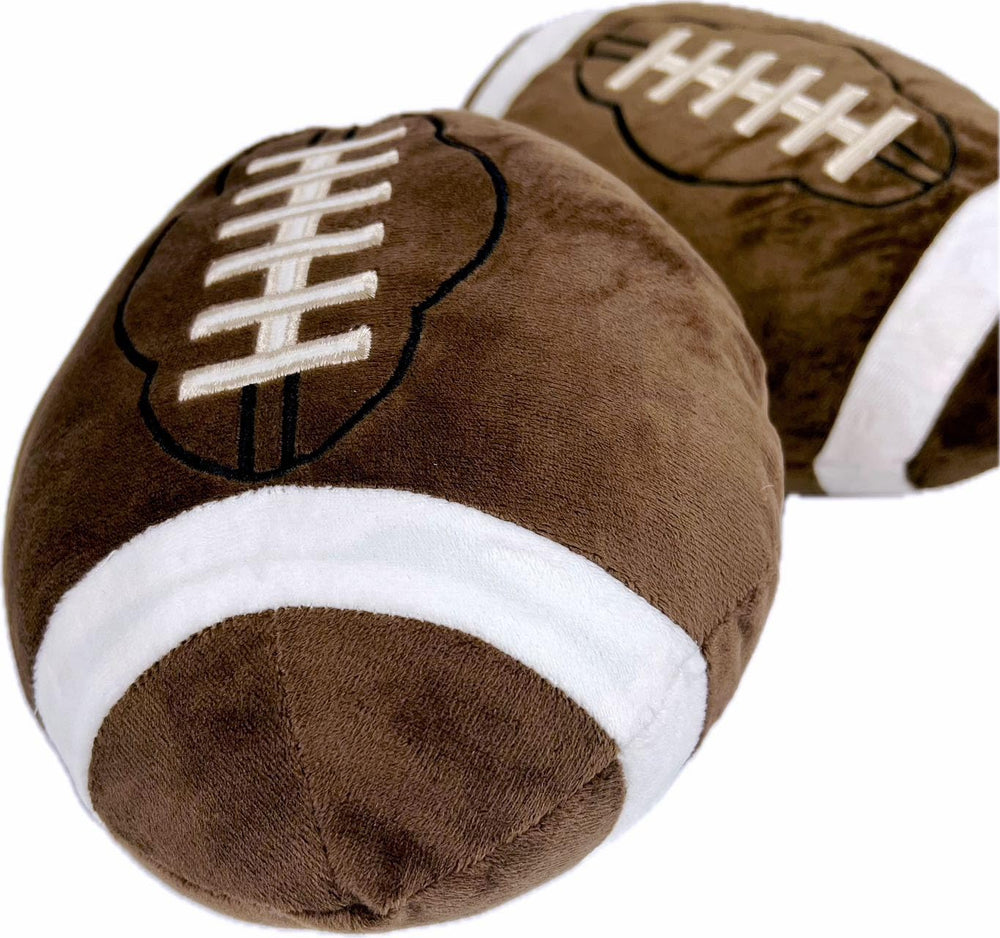 GiftExpress football plush pillow resting on a sofa for cozy game-day vibes