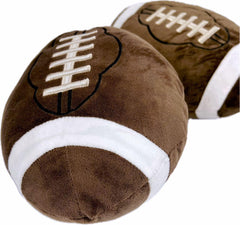 GiftExpress football plush pillow resting on a sofa for cozy game-day vibes