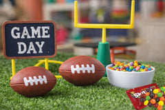 GiftExpress Superbowl party decor with foam footballs enhances game-day visuals.