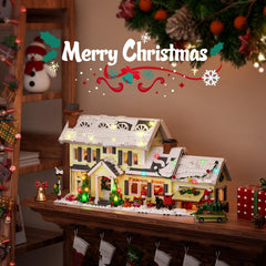 GIKCFSTBLA Lighted Christmas village house showcasing warm ambient glow for holidays.