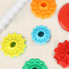 GKKBSJ Rainbow Tower rod-handle use promoting grip strength and coordination.