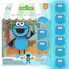 Glo Pals Julia character glowing in a bath for sensory play.