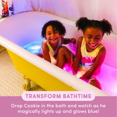 Glo Pals orange cubes glow in tub to invite exploration.