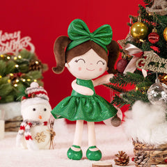 Gloveleya Christmas Baby Doll holding a stocking for holiday decor and play