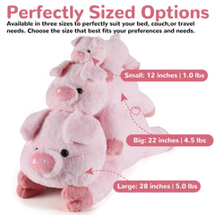 Gnomantic pig weighted plush, size reference with hand for scale.