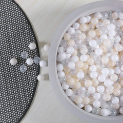 GOGOSO ball pit balls beige, white, and transparent for colorful toddler play.