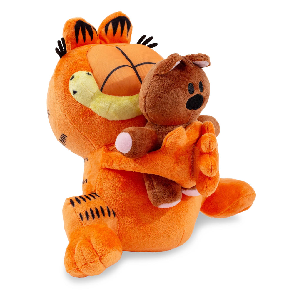 Golden Bell Garfield holding Pooky plush, perfect for cozy snuggles.