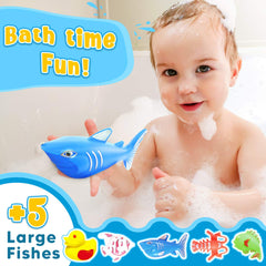 Children playing Goody King fishing game outdoors at a water table.
