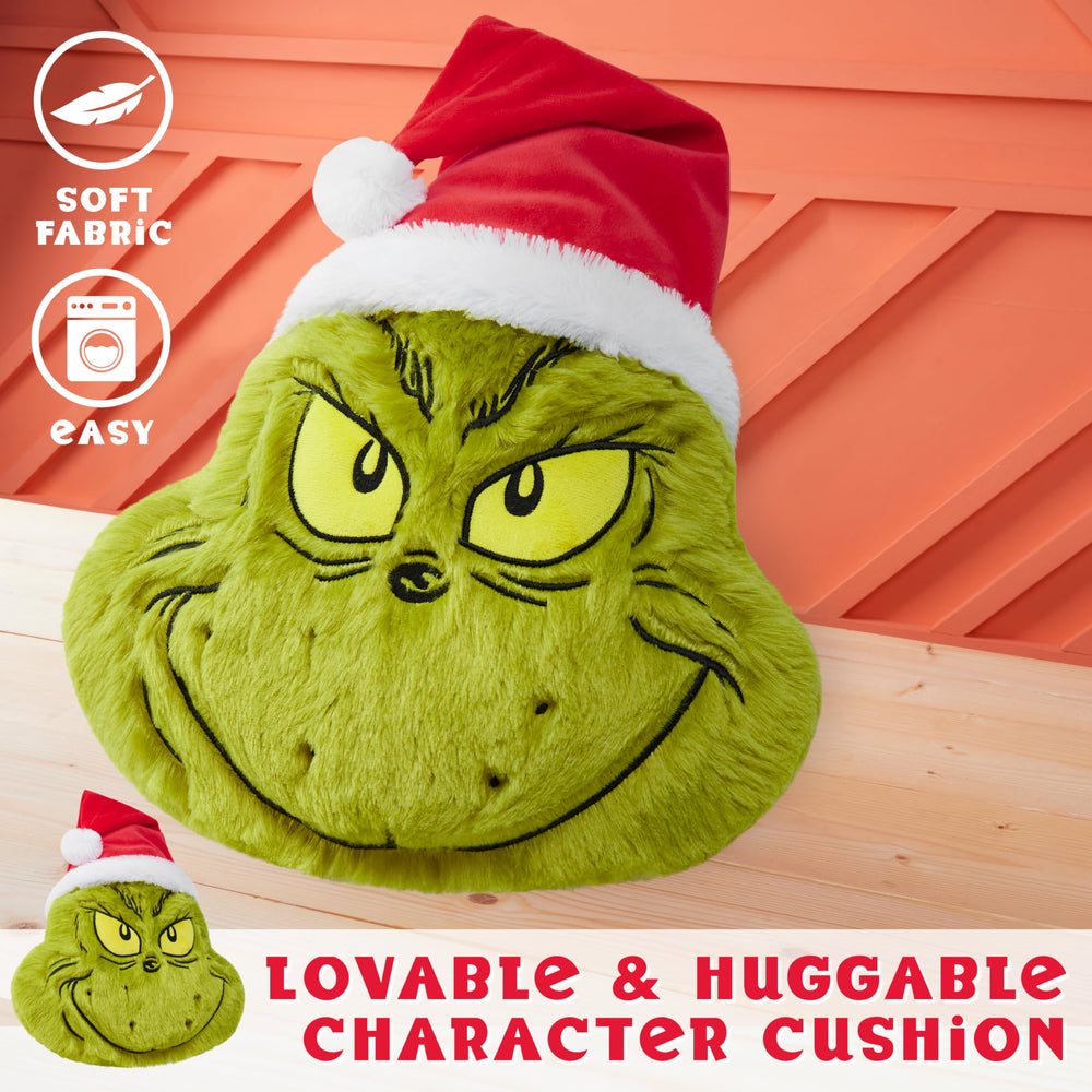 The Grinch pillow enhances holiday spaces on beds or sofas.
