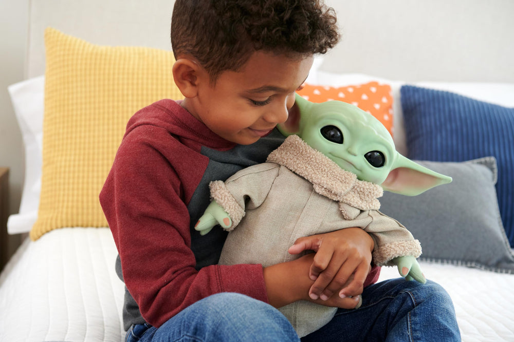 Mattel Grogu plush eyes blink when squeezed for interaction.