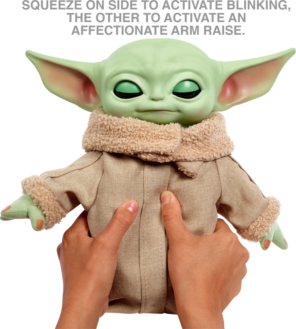 Squeeze Grogu on one side to trigger blinking eyes and sounds.