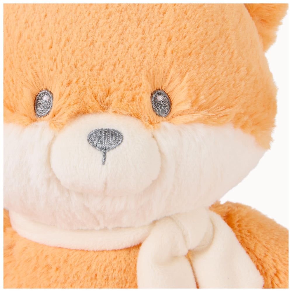 GUND fox plush packaged in recycled materials, ready for gifting.