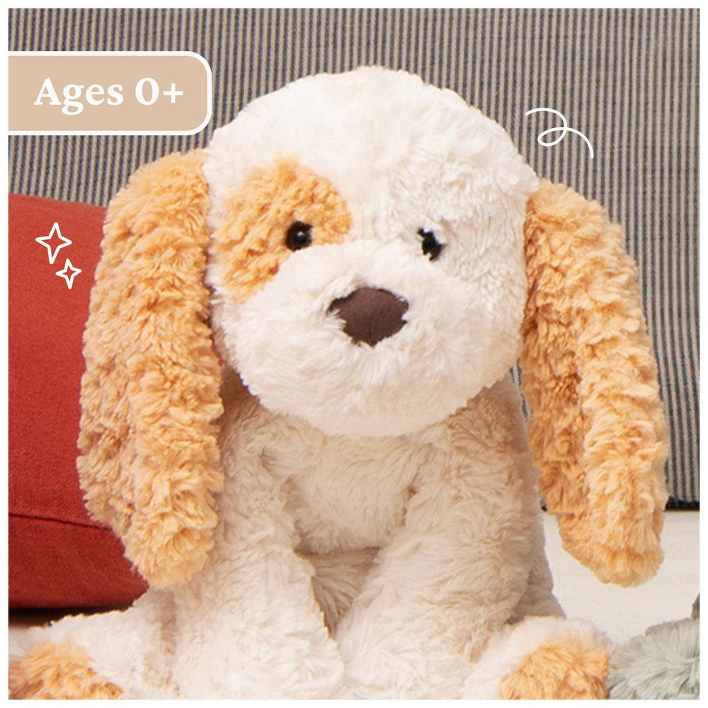 Floppy limbs invite hugs and imaginative play with the GUND Cozys Puppy Plush.