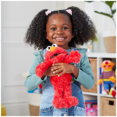GUND Elmo soft red plush fur texture for comforting hugs.