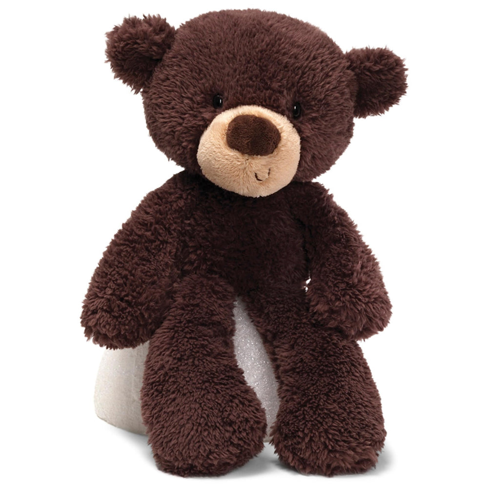 GUND Fuzzy teddy bear face close-up, soft plush for cuddling.