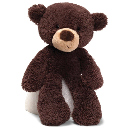GUND Fuzzy teddy bear face close-up, soft plush for cuddling.