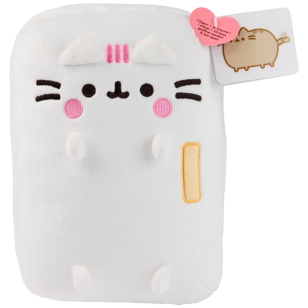 GUND Pusheen kitchen plush on desk, adding cute charm to any space.