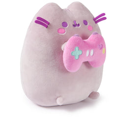GUND Pusheen Gamer Plush holding controller for playful desk companion.