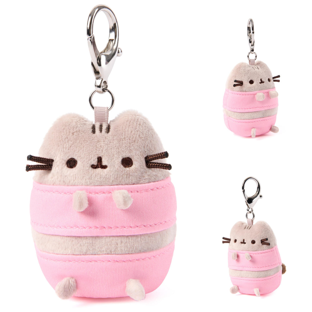 GUND Pusheen held in hand to show 3-inch compact size and portability