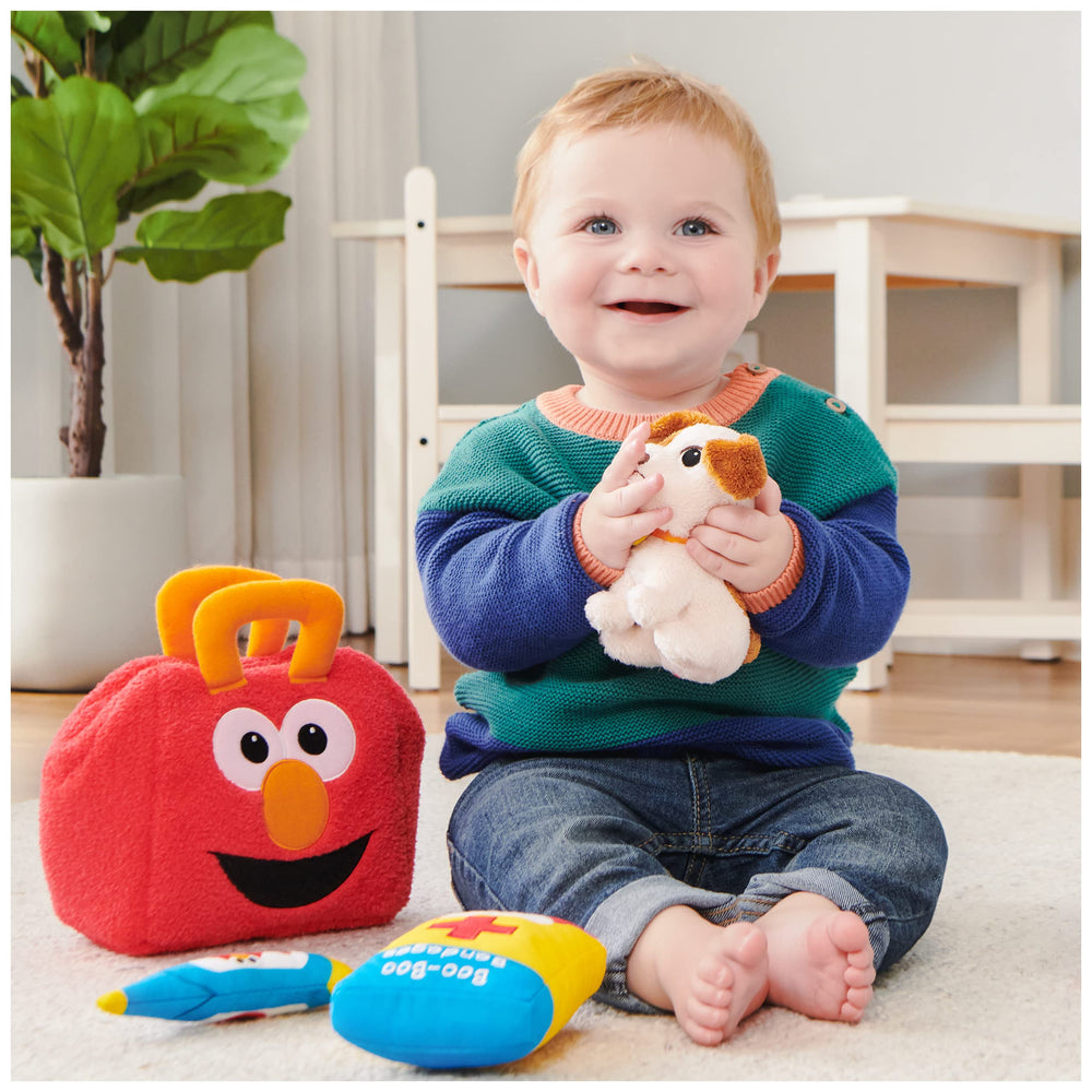 GUND Sesame Street bandage box rattle with gentle chimes.