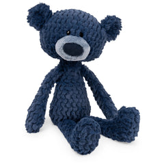 GUND Toothpick Ripple 15-inch navy plush with textured ripples for cozy cuddling on trips.