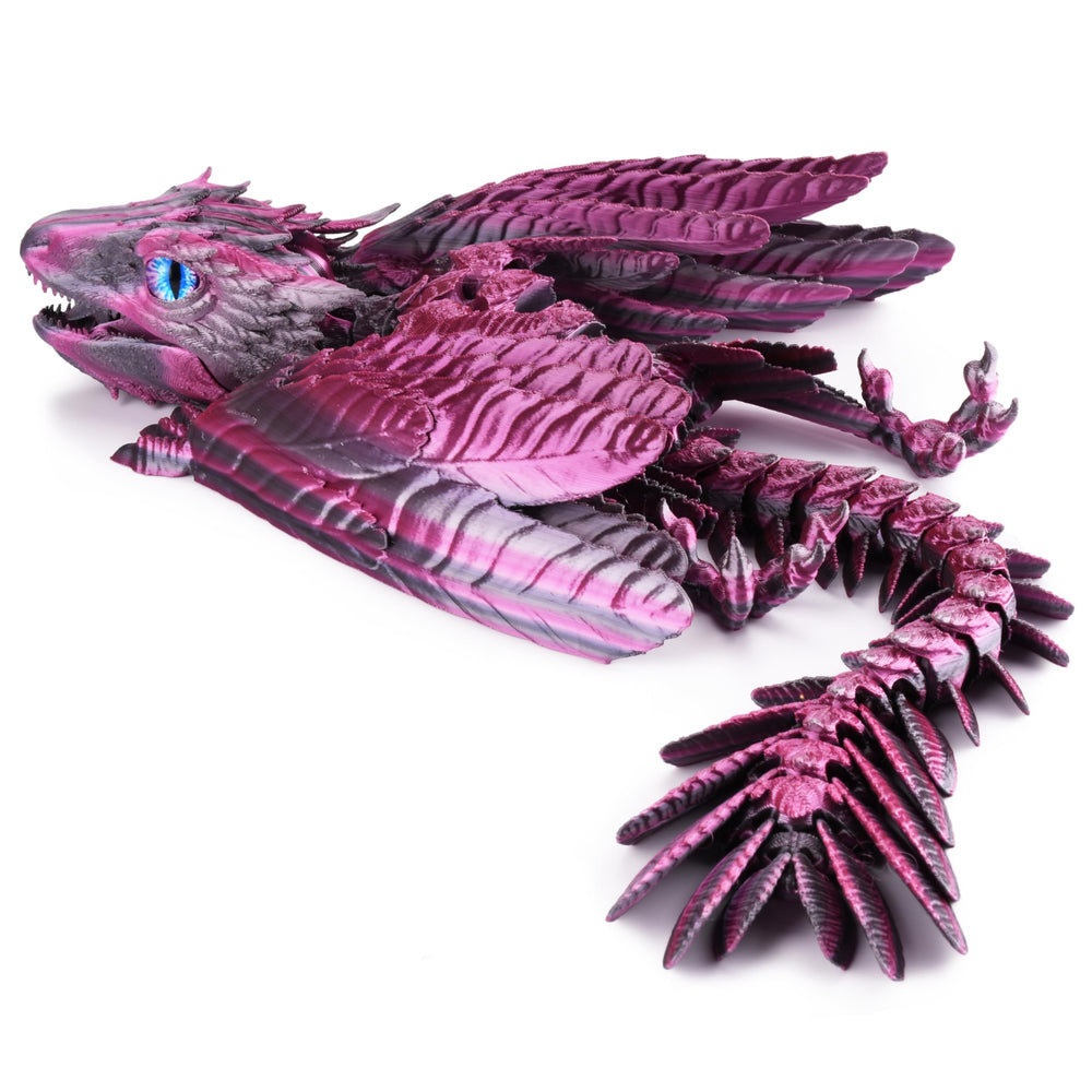 Guwewu Feathered Wyvern Dragon on a desk, showcasing detailed handcrafted craftsmanship.