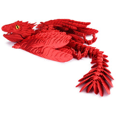 Guwewu Feathered Wyvern on desk in pose-1, a tactile focus for concentration.