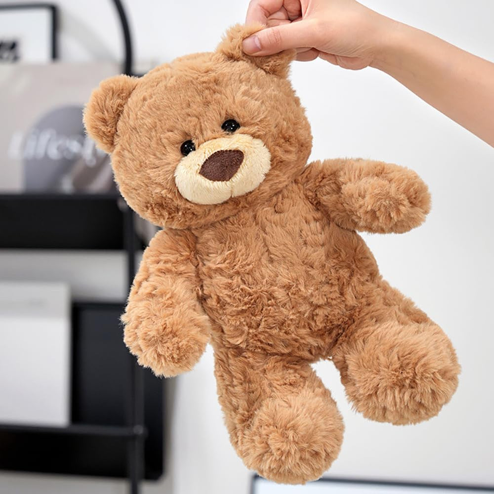 Gwxqybfe teddy bear close-up face with embroidered features and warm fur.