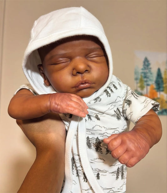 GYCV lifelike reborn black boy doll with birth certificate for imaginative play and keepsake.