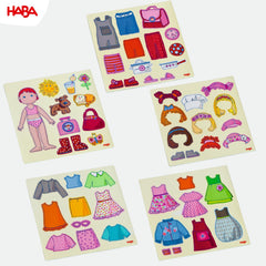 HABA 54 magnetic pieces including outfits, hairstyles, shoes, accessories