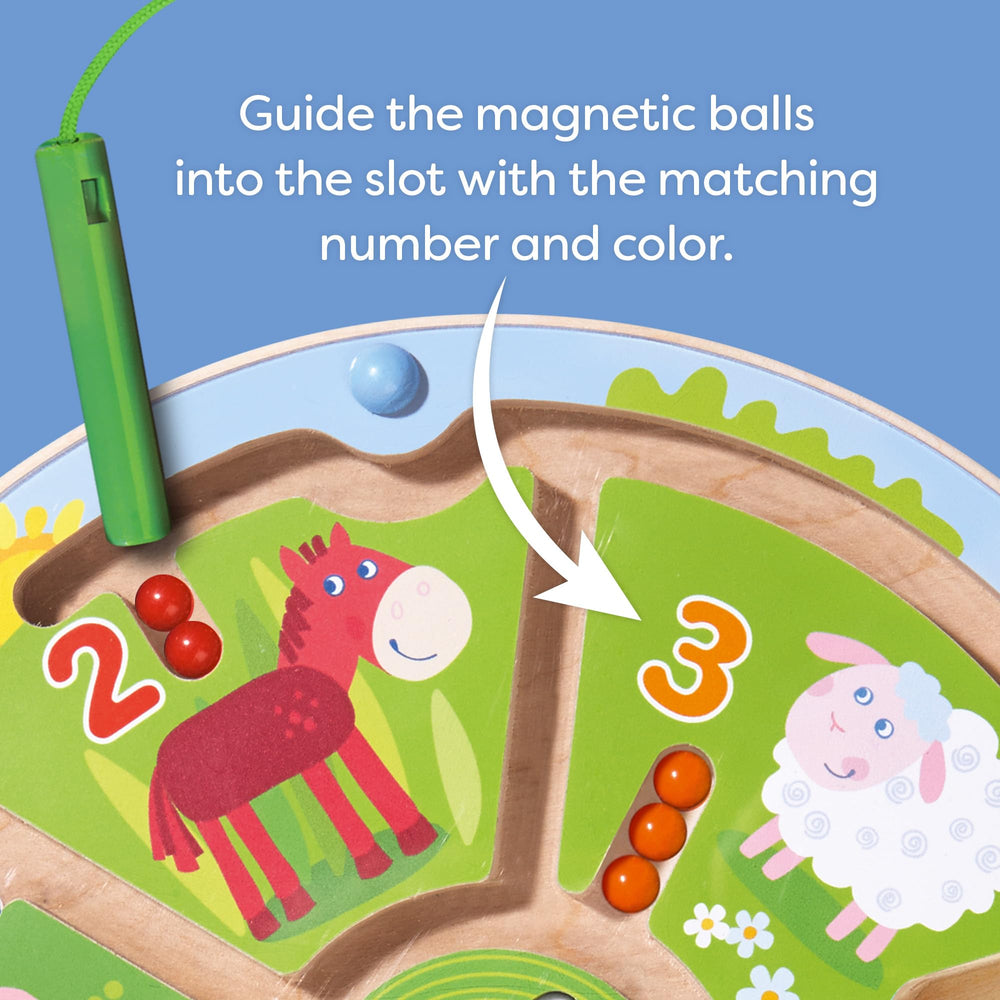 HABA Busy Board encourages animal and number matching with magnetic balls for dexterity.
