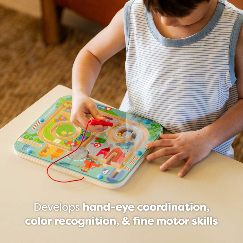 HABA Busy Board wand tether demonstrates easy reach and safe, mess-free exploration on the go.