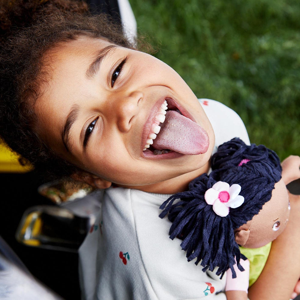 HABA Cari embroidered face detail, friendly expression for imaginative play.