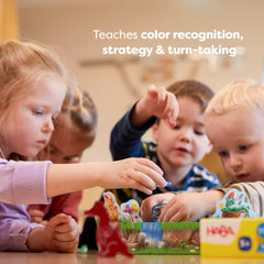 HABA Dragons Breath family game night scene encourages togetherness and shared problem solving