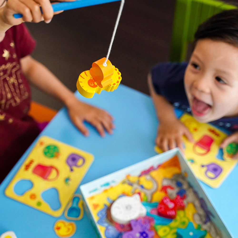 HABA Here Fishy Fishy toddler setup for 1-4 players supports scalable play.