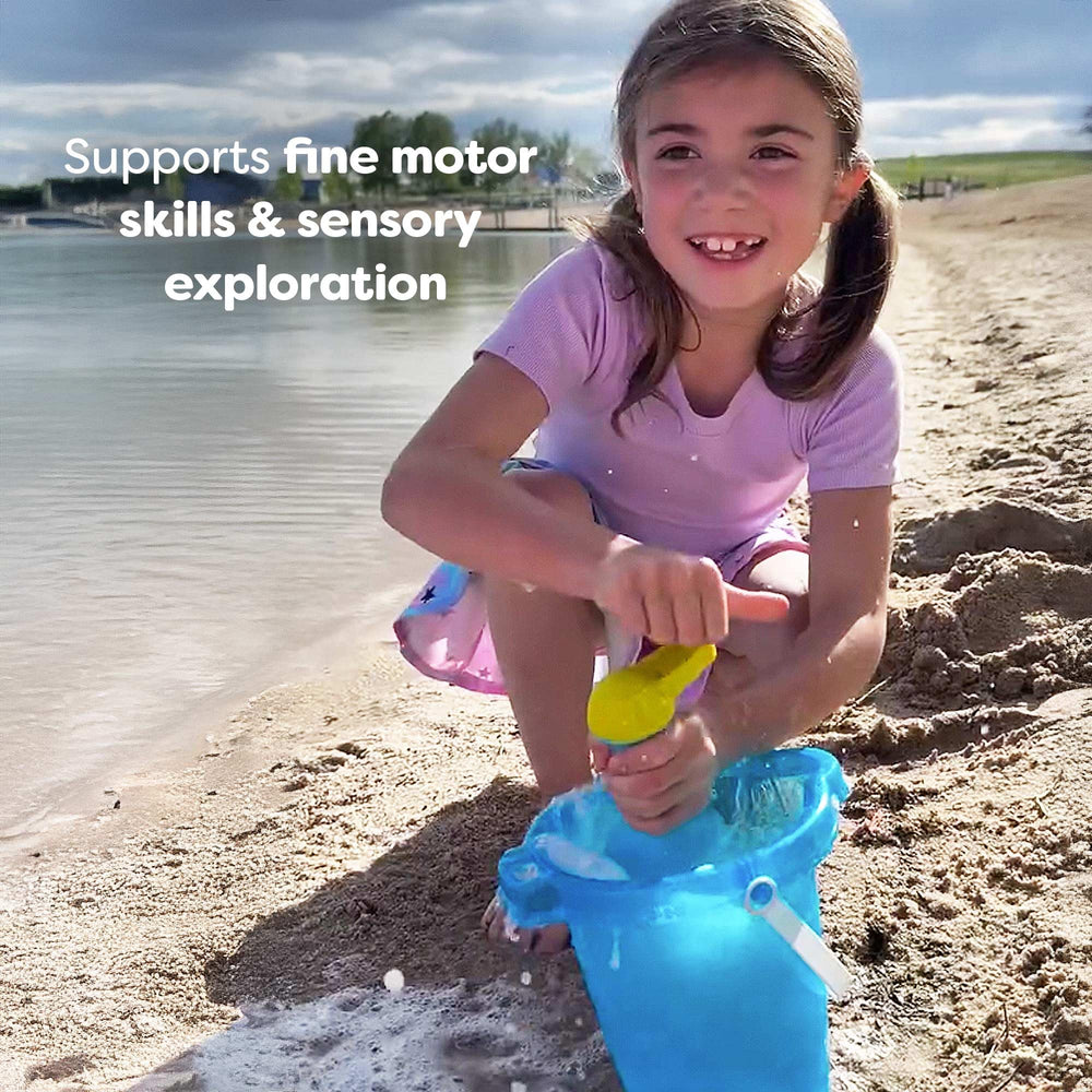 HABA outdoor bath whisk for backyard pretend play.