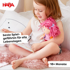 HABA Lilli-Lou pink chenille pigtails invite tactile play and cuddling.