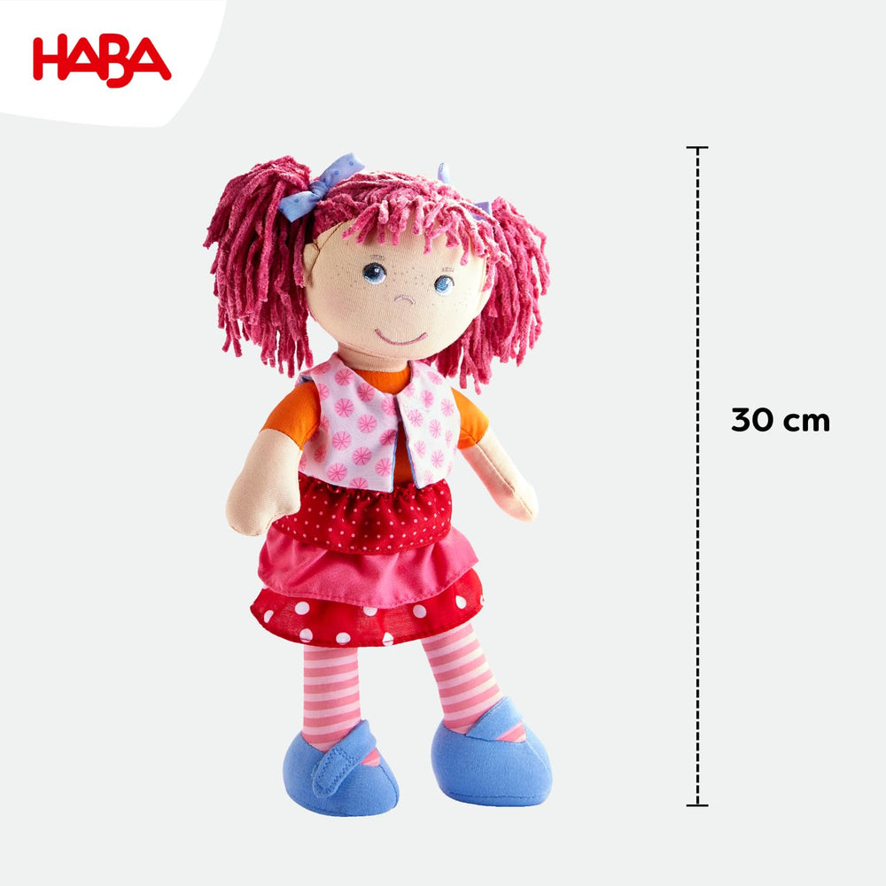 HABA Lilli-Lou removable vest and skirt support mix-and-match outfits.