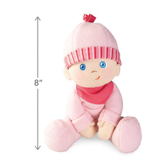 Close-up of HABA Luisa's soft plush face inviting tactile exploration.