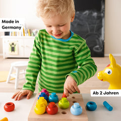 HABA Rainbow Whirls wood finish close-up, reveals beech wood and water-based stain.