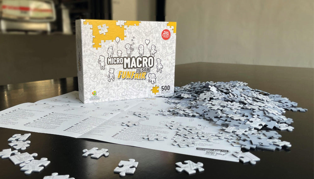 Vibrant box art invites curiosity in Hachette MicroMacro Funfair puzzle.