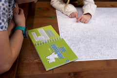 Hachette MicroMacro Kids investigator notebook shows clue organization for 22 kid-friendly cases.