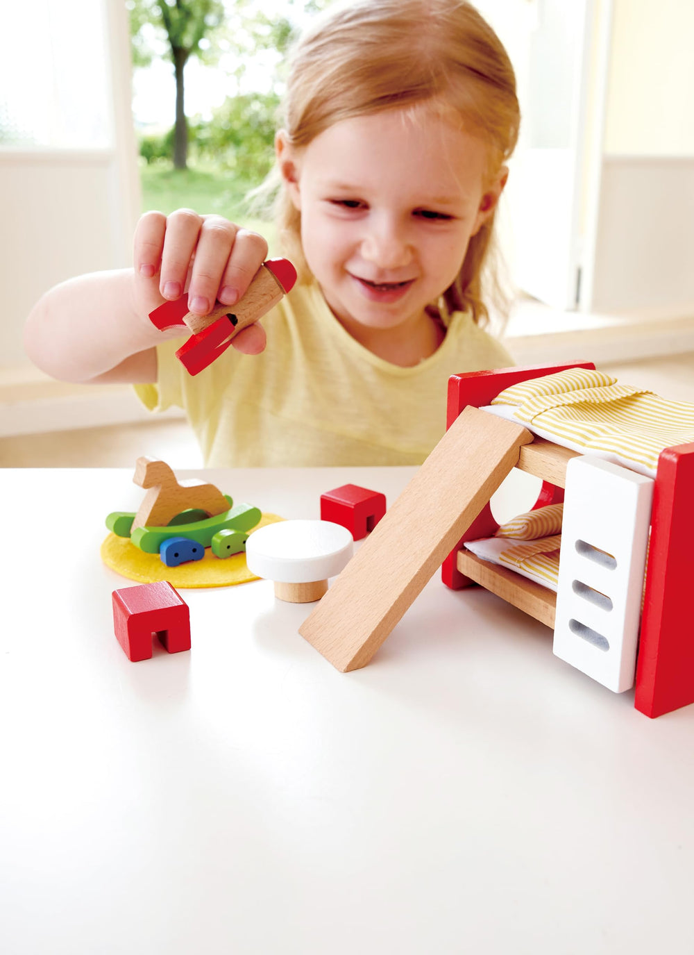 Hape table and chairs set for tiny characters' meals and gatherings