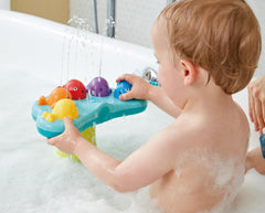 Hape Music Fountain Bath Toy battery compartment requires four AA batteries