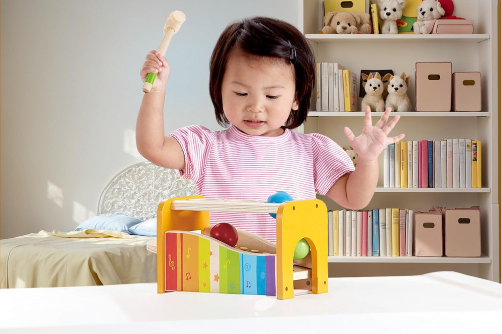 Hape Pound & Tap Bench toddler play session promoting motor skills