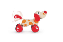 Hape Walk-A-Long Puppy action shot highlighting rolling motion