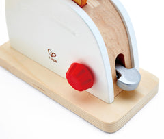 Hape wooden plate complements slices for pretend meal