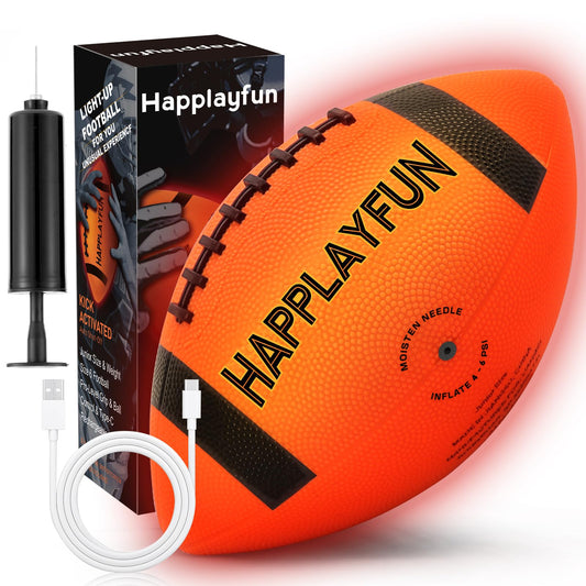 Happlayfun light-up football glowing in the backyard for nighttime play.