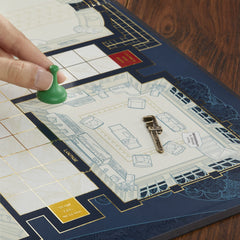 Hasbro Gaming Clue Signature Collection in-box-storage-solution keeps components organized after play.
